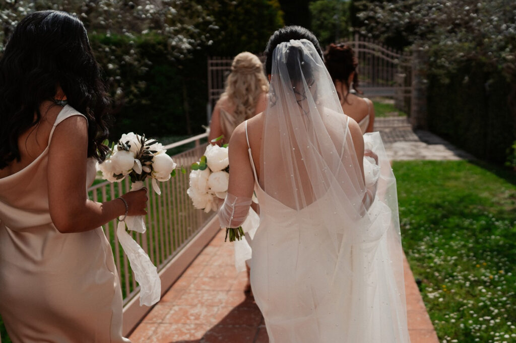 Bride and groom standing together during an outdoor symbolic ceremony