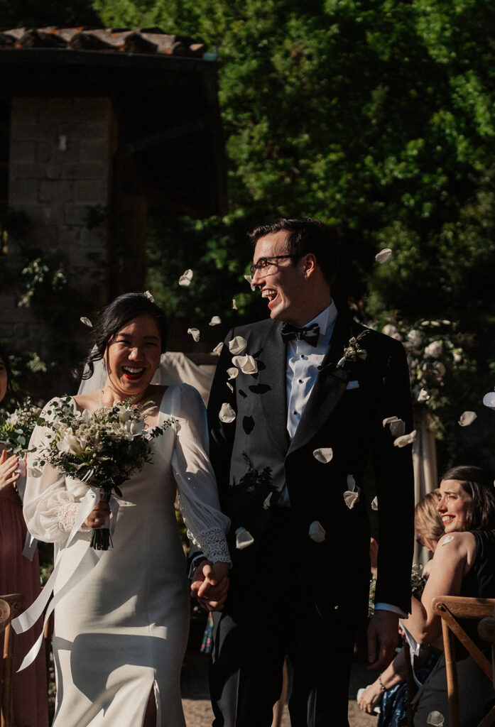Couple sharing an intimate moment during an evening wedding ceremony