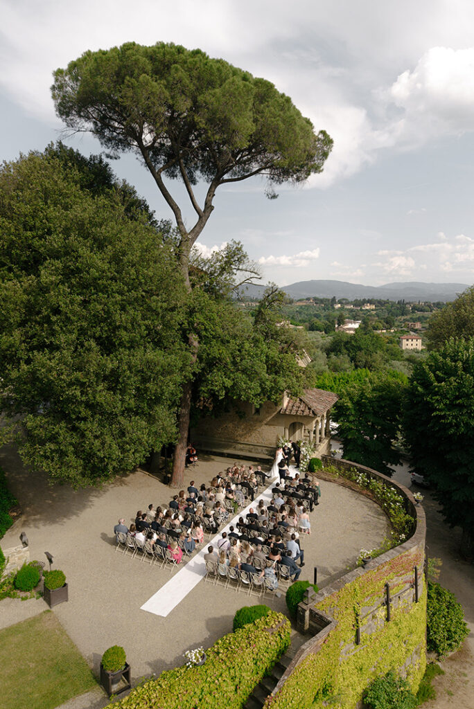 Couple overlooking the green hills of the Tuscan countryside